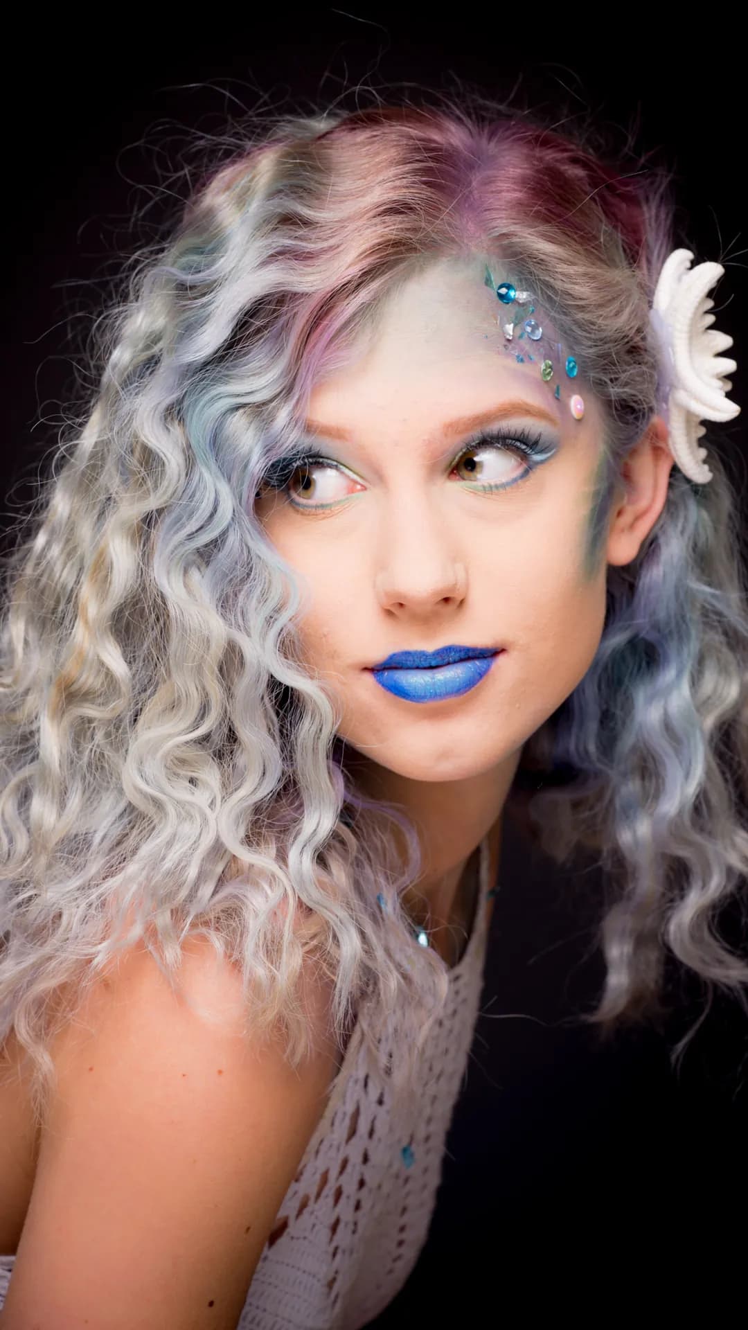 Beauty professional in lash studio
