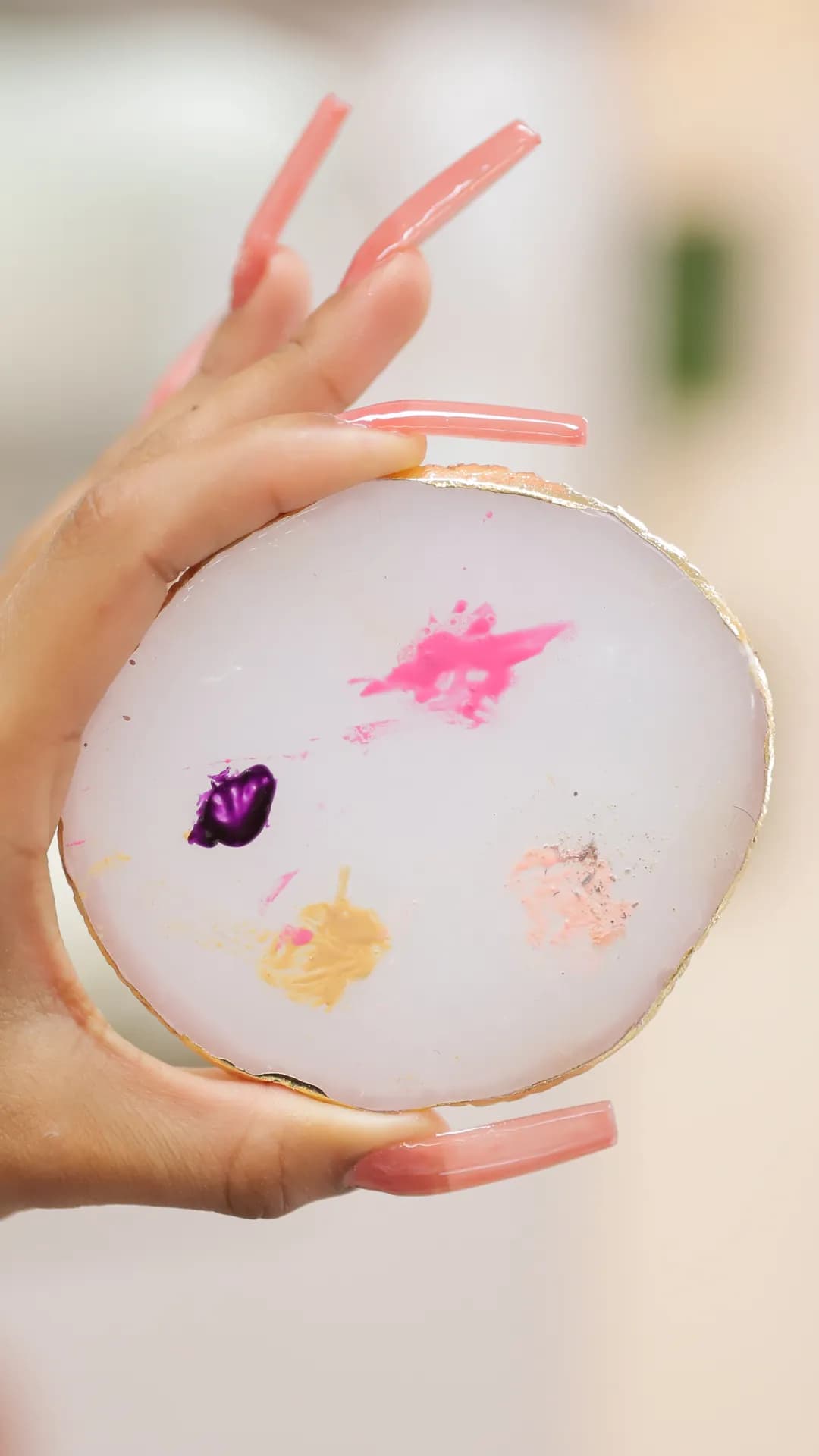 Nail artist creating intricate nail art